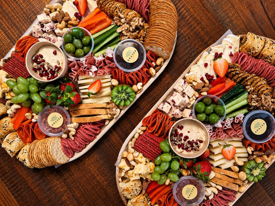 A large Grazer Liverpool graze board of cheeses, cured meats, fruit and crackers